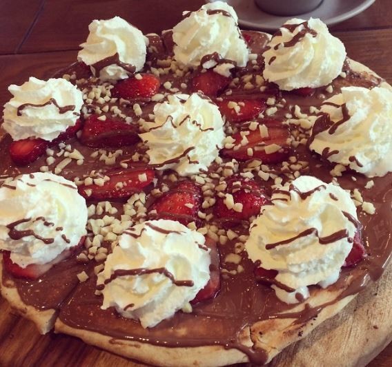 Cowch Pic 1 - Sundays are for sharing Our new menu includes the delicious Strawberries Cream Dessert Pizza as well as some exciting new flavours