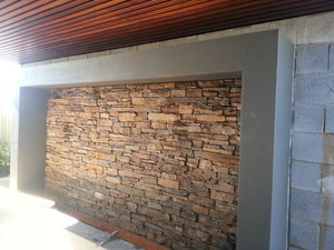 A List Tiling Service Pic 5 - Outdoor Stone feature wall and waterfall