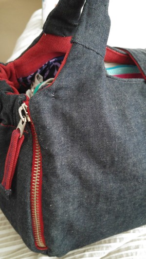 Liz King Designs Pic 4 - Nappy bag showing side zip with opening to make it easier to fit all your stuff in it