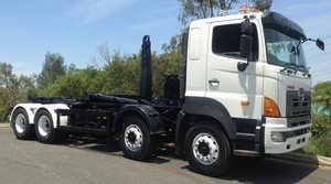 Retruck Australia Pty Ltd Pic 3 - 2007 Hino FY 700 Series 8x4 Hook Loader Imported Converted to suit Australian Standards Hook Loader Crane Trucks Tilt Trays Beaver Tail Tippers More available