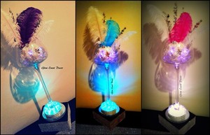 Glow Event Decor Pic 3 - Brandy Balloon table centrepieces with submersible LED lighting ostrich feathers available for hire Glow Event Decor