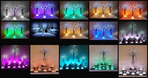 Glow Event Decor Pic 2 - LED branch table centrepieces with LED light bases and LED submersible lighting in vases available for hire Glow Event Decor