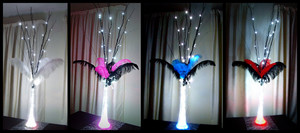 Glow Event Decor Pic 4 - Ostrich Feather LED branch table centrepieces with LED Eiffel tower vases available for hire Glow Event Decor