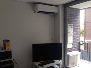 Top Class Comfort Air Conditioning Pic 2 - The supply and installation of a Fujitsu 5kw high wall reverse cycle inverter air conditioning unit in an apartment in Randwick Sydney