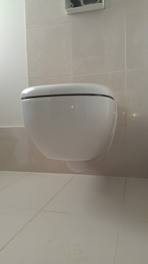 G Marks Plumbing Pic 3 - Toilet with cistern hidden in wall