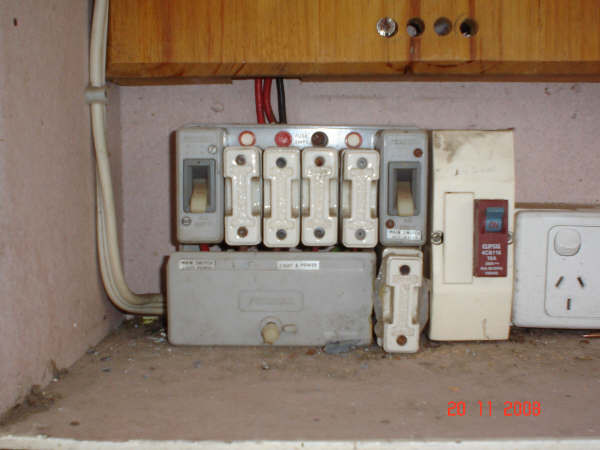 Corelly Electrics Pic 1 - does your main fusebox look like this exposed mains loose fuses improper repairs time for an upgrade