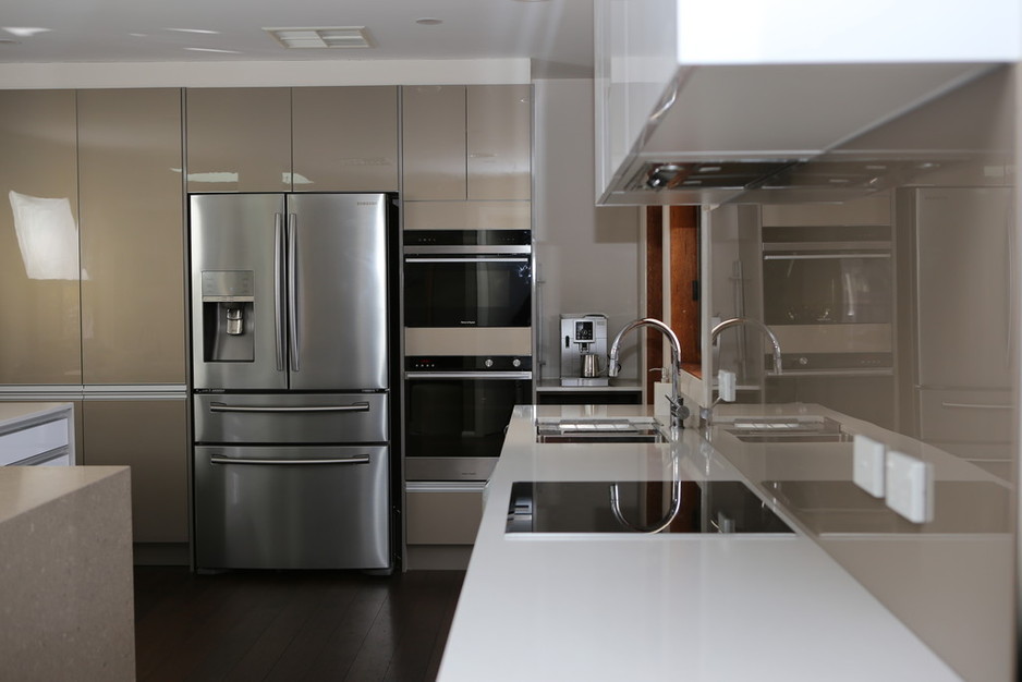 Bella Vie Interiors Pic 1 - Gordon Kitchen Shitake Osprey Caesarstone bench tops Bronze and white gloss cabinetry Glass Splashback