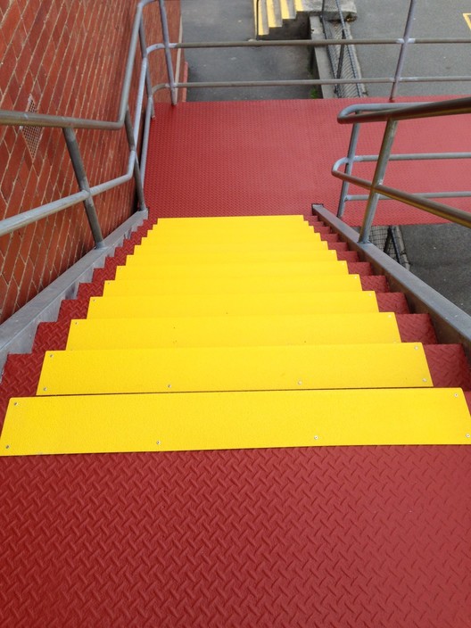 Floor Safety Services (Aust.) Pty Ltd Pic 1 - AntiSlip Stair Nosing over AntiSlip Coating on metal stairs