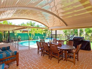 Queensland Lifestyle Patios Pic 4 - Note the reflective features of the Stratco Outback Roofing Also included the concrete stencil work and pool fencing