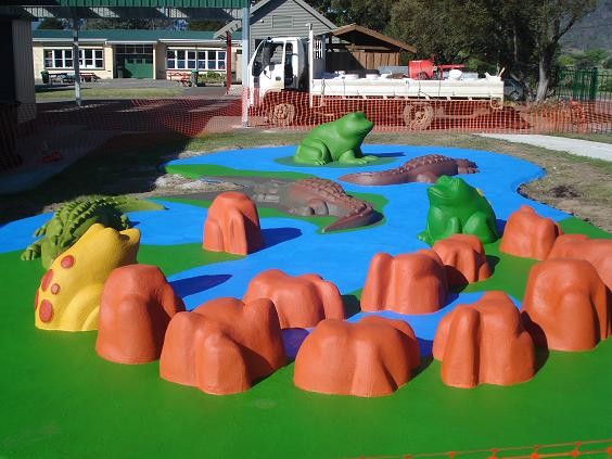 Playtas Group Pic 1 - outdoor learning area consisting of rubber softfall and animal play items