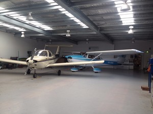 Phoenix Aero Club and Flying School Pic 5 - Our club aircraft sitting inside the hangar