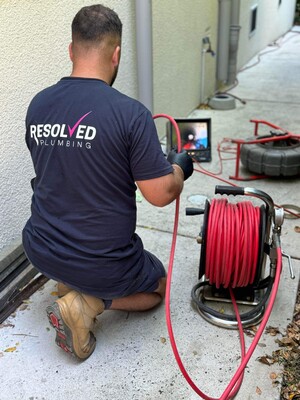 Resolved Plumbing Pic 2 - cleaning out a sewer drain with a high pressure water jet and using a drain camera to see what caused the blockage