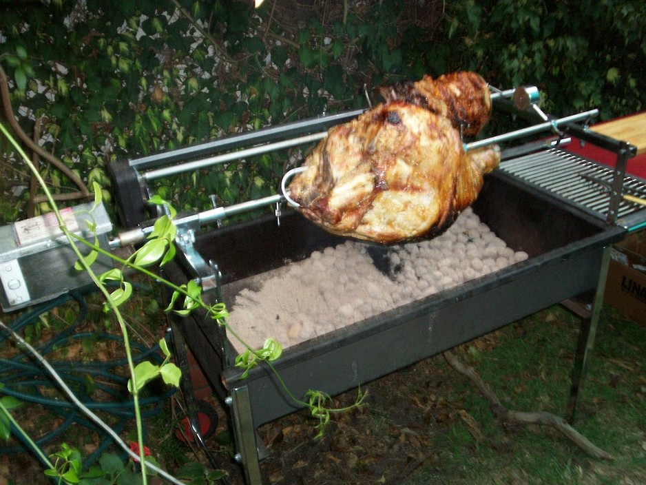 Spits & Bits Pic 1 - Cooking up a Leg of Pork on a 3Ft Charcoal Spit Roast Yummy