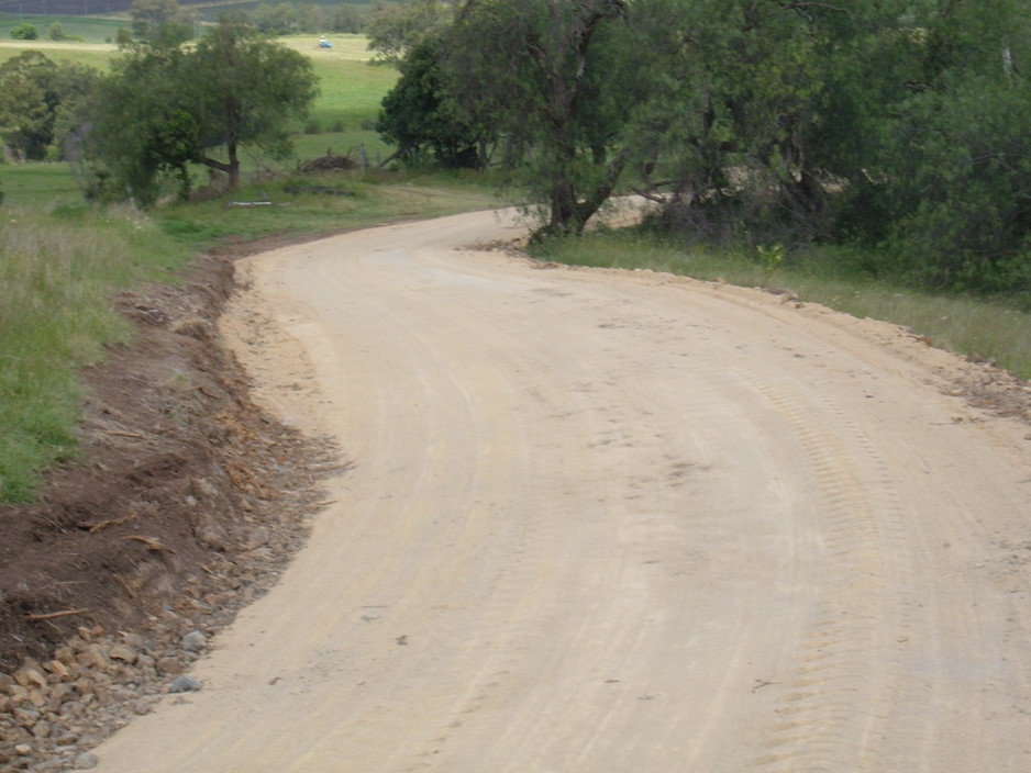 ABC Bobcat & Bitumen Service Pic 1 - Gravel road with sandstone overlay