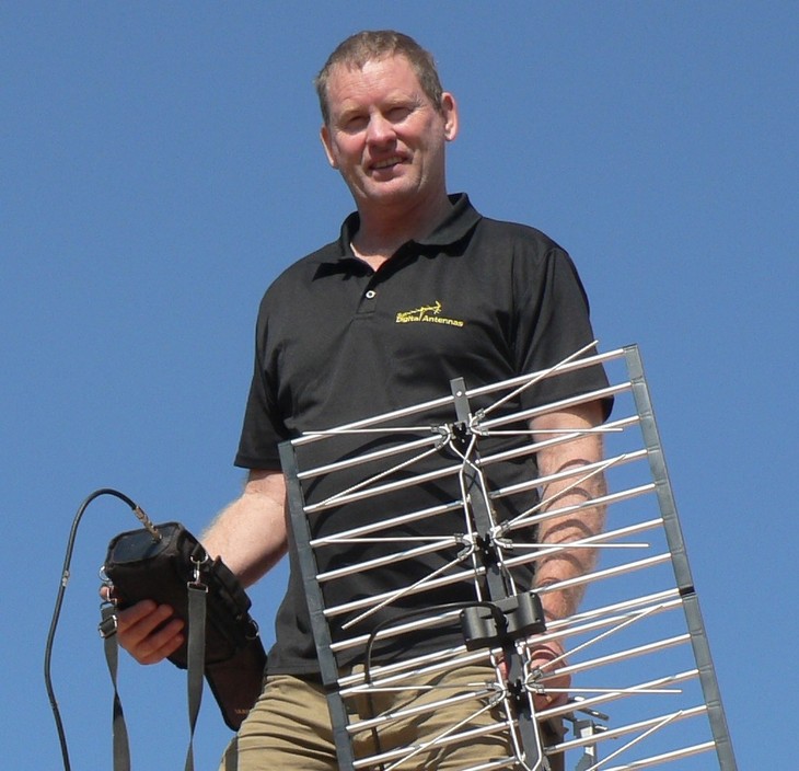 Sun Digital Antennas Pic 2 - David Testing For Signal On A Customers Roof