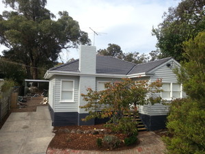 DryaZ Roof Tiling and Restoration Pic 4 - full roof restoration comprising over valley replacement rebed and point scocia on gable installed high pressure clean broken tiles replaced and 3 coat sealer and paint system