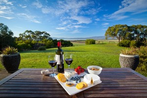 Coastal View Cabins Pic 5 - Enjoy some local wine and cheese from your private balcony