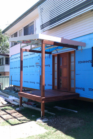 Glenn Walker Carpentry Contractor Pic 2 - Small entry landing with skillion roof and timber door with sidelights