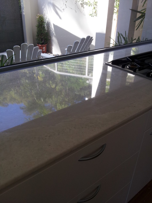 Reseal Stone Pic 1 - stone benchtops can be returned to their former glory using diamond abrasive technology then sealed and repolished