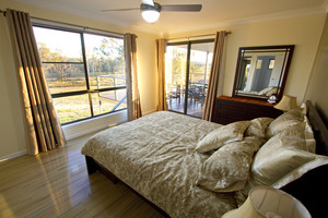 Stockton Rise Country Retreat Pic 2 - The main bedroom A peaceful view from the window and easy access to the deck