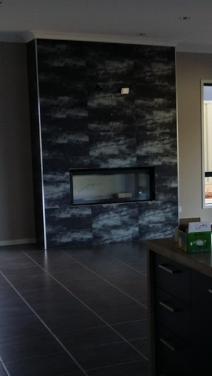 Nathan Rogers Tiling Pic 3 - Feature tiled fire place