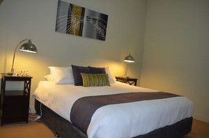 Revive Central Apartments Pic 5 - Luxury King Bedroom