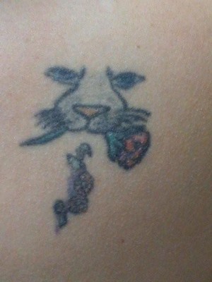 Tattoo Removal WA Pic 4 - Cat with rose Tattoo Removal Before photo