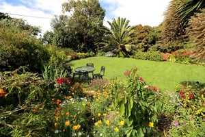 King Island Green Ponds Guest House Pic 4 - Relax in the gardens at King Island Green Ponds Guesthouse