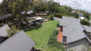 Deeluxe Riverspa Apartments Pic 5 - View over the pool lawn and garden from Prestige and Deeluxe King Spa Apartments