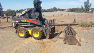 Kapunda Plant Hire Pic 4 - Turbo power bobcat with auger bits Trencher Forks