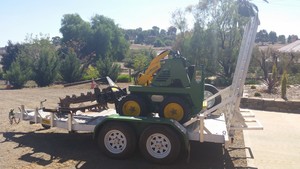 Kapunda Plant Hire Pic 3 - Kanga with auger and trencher all very portable and compact