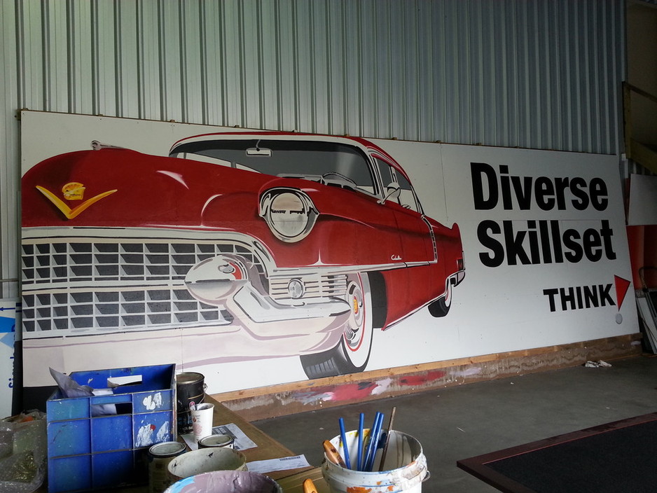 Think Graphic Communication Pic 1 - Hand painted sign on our sign wall for fun