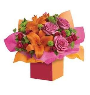 WILD BLOOMING BUNCH FLORIST Pic 2 - Bright box flower arrangement