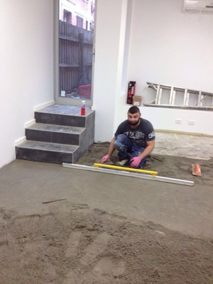 National Tilers Melbourne Pic 2 - Screeding an office floor on Sydney rd Melbourne