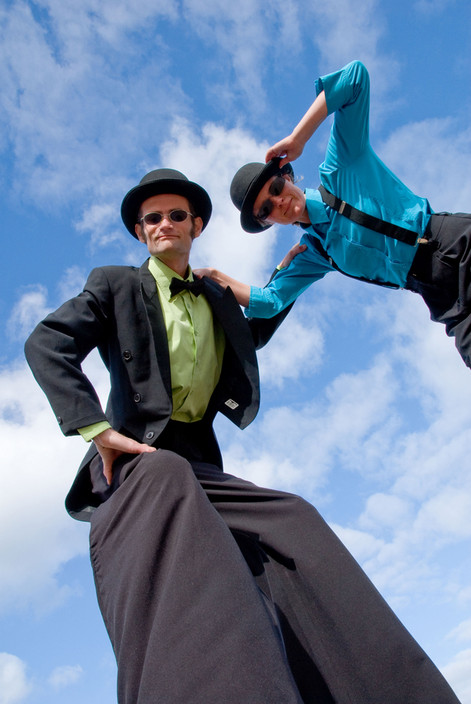 Circus Elements Pic 1 - Formally dressed stilt walkers