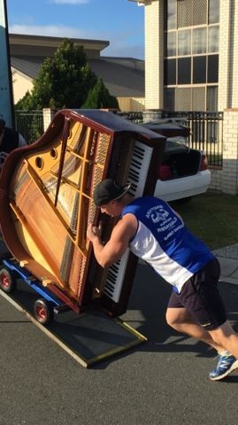 Super Movers Pic 1 - Heavy Crew Operator and Owner Tim Relocating a Baby Grand Piano