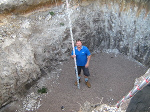 Mr Drainage Pic 5 - Steve in a deep excavation for two 10000 ltr underground rainwater tanks