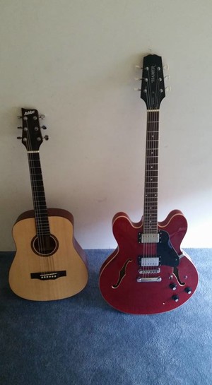 Defy Reality Music Tuition Pic 3 - child size and full size guitars available HERE at our studio