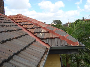 PH Roofing Services Pic 4 - Rebeded repointed ridge capps on tile roofs