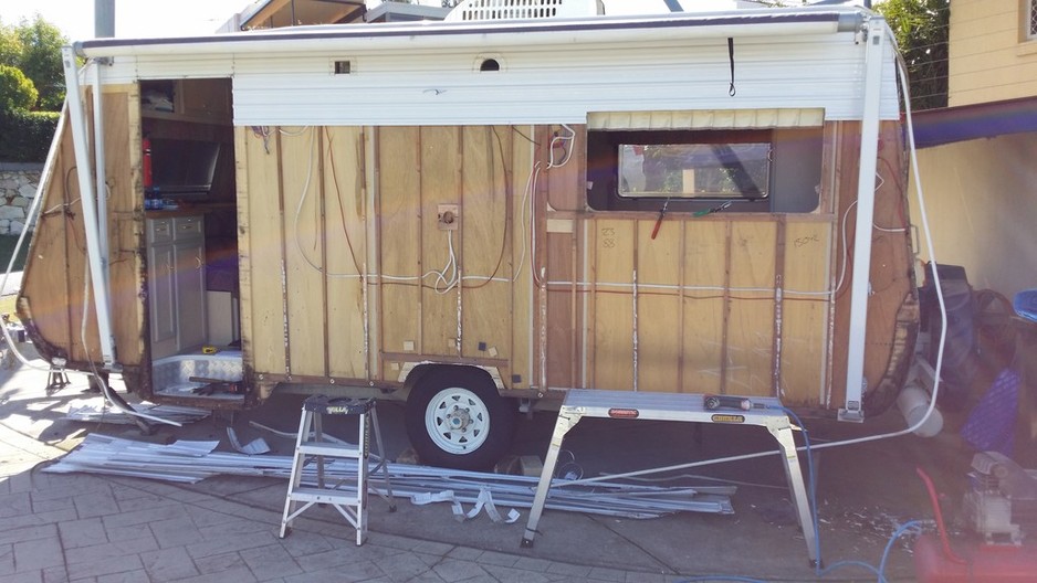 Jacks Mobile Caravan Service and Repairs Pic 1 - Hail damaged paramount getting new panels to nearside front and rear walls Note rot in front rear corners and around door frame