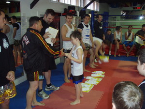 Ultimate Muay Thai, Kickboxing, Boxing, MMA Pic 3 - John Scida Awarding certificates to kids at grading