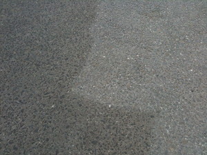 Enviro Blast Australia Pic 4 - Oil removed from exposed aggregate driveway using soda with water spray