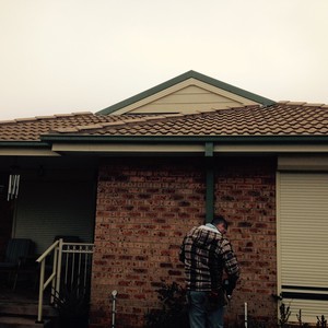 ACT Gutter Service Pic 2 - After storm slotted quad gutter Mist Green fascia cover Smooth Cream downpipe 100x75mm