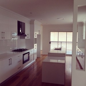 Taylor Made Painting Pic 2 - A kitchen at completion in a two storey duplex that we painted throughout