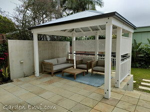 Garden Envi Pic 5 - Gazebo with no overhang to optimize small spaces This Gazebo has a handrail and lattice screening added that matches the residence