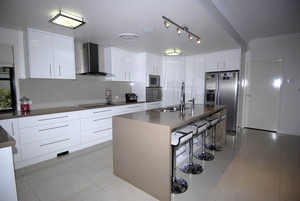 Dave Harris Cabinets Pic 2 - kitchen with stone benchtops and 2pac doors