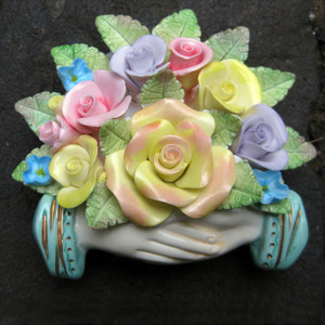 Flowerdust Pic 2 - Hands with bouguet colored porcelain ornaments