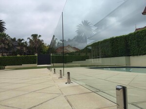 Waratah Glass Fencing Pic 4 - Frameless Pool Fence on Tiled Concrete Slab