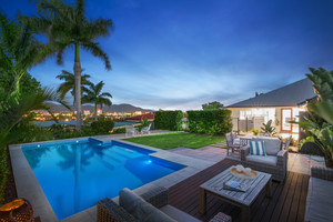 Real Property Photography Rockhampton Pic 5 - twilight shoots are perfect for beautiful pools and outdoor areas I can really work with the lighting and reflection off the pool to create a stunning night time image