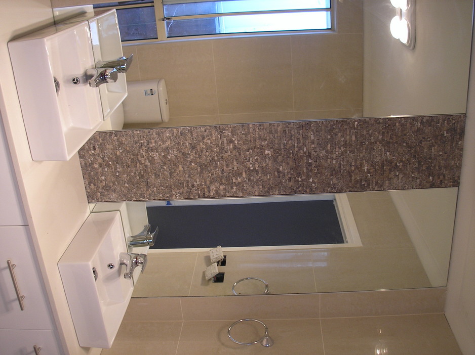 BWL Plumbing Pic 1 - the right idea to break up the mirror for his and her vanity basins